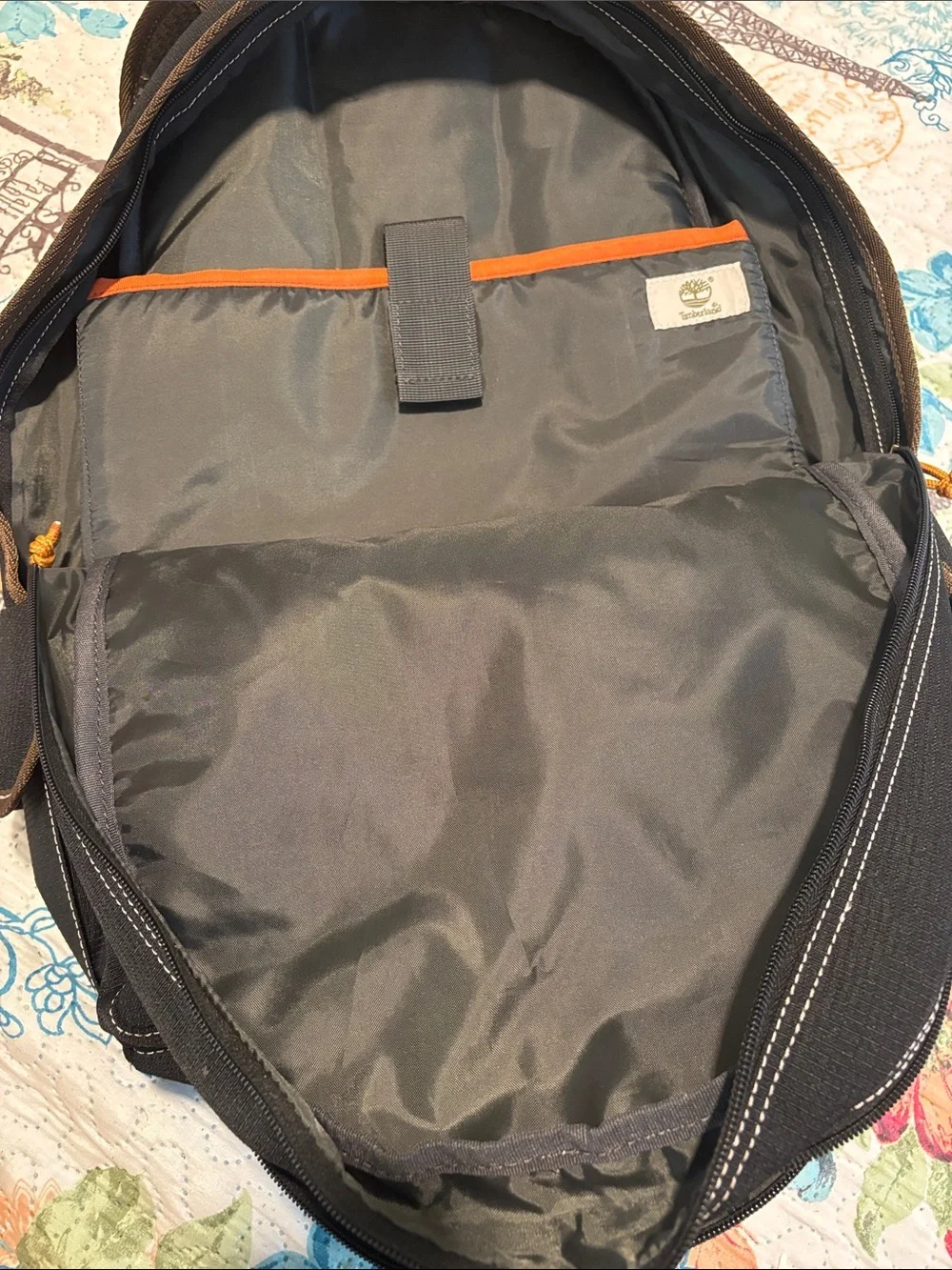 Timberland Black Canvas Backpack with Brown Trim and Orange Pull